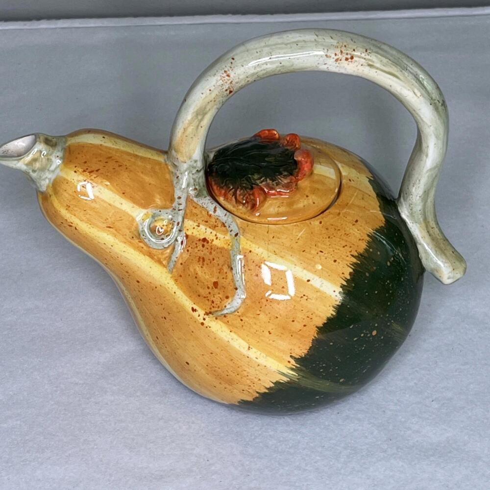 VTG Ceramic Orange Slanted Gourd like Pitcher Brown Twig Leaf Handle